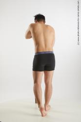 Yoshinaga Kuri Resting With Wooden Stick